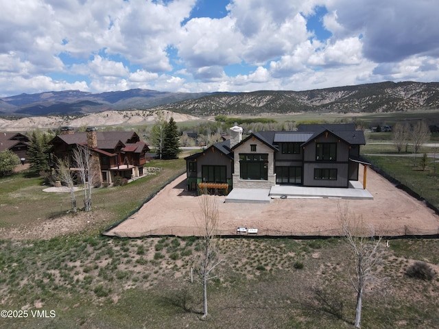 213 Harvester Ct, Eagle, CO 81631 - rear view of house featuring a mountain view