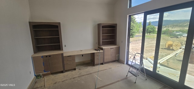 213 Harvester Ct, Eagle, CO 81631 - unfurnished office with a mountain view and a towering ceiling