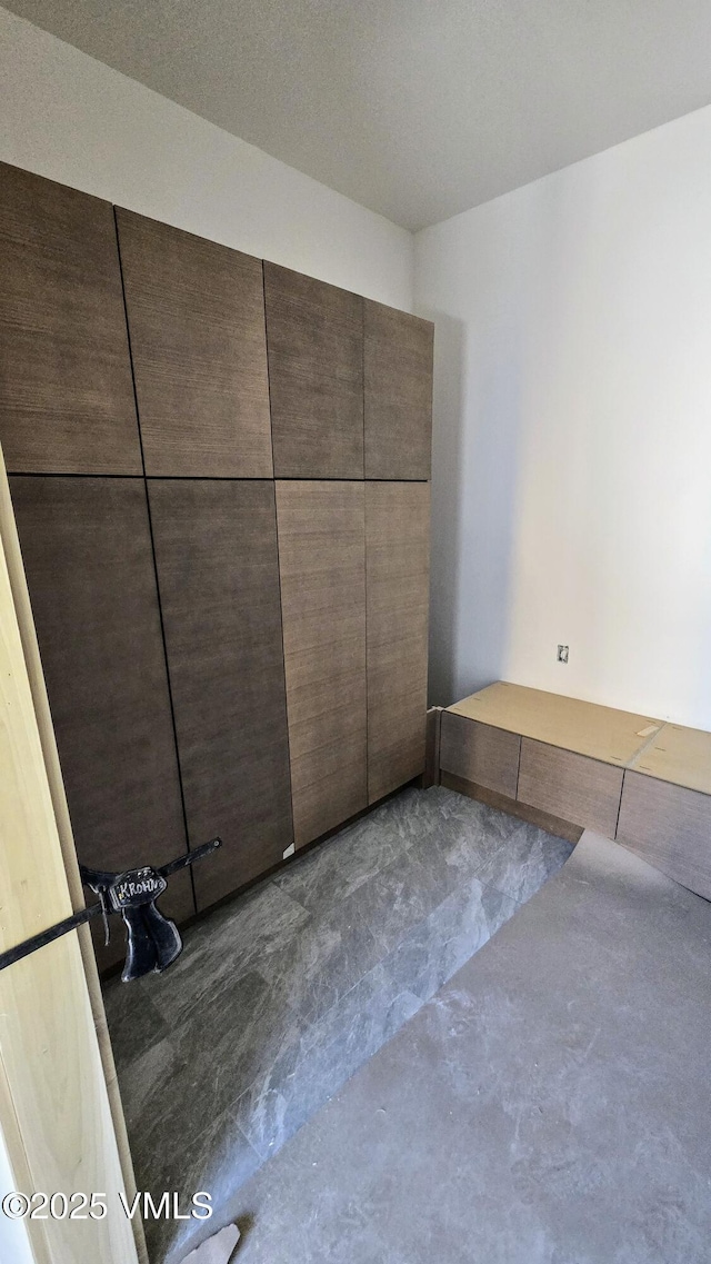 213 Harvester Ct, Eagle, CO 81631 - unfurnished bedroom with concrete flooring