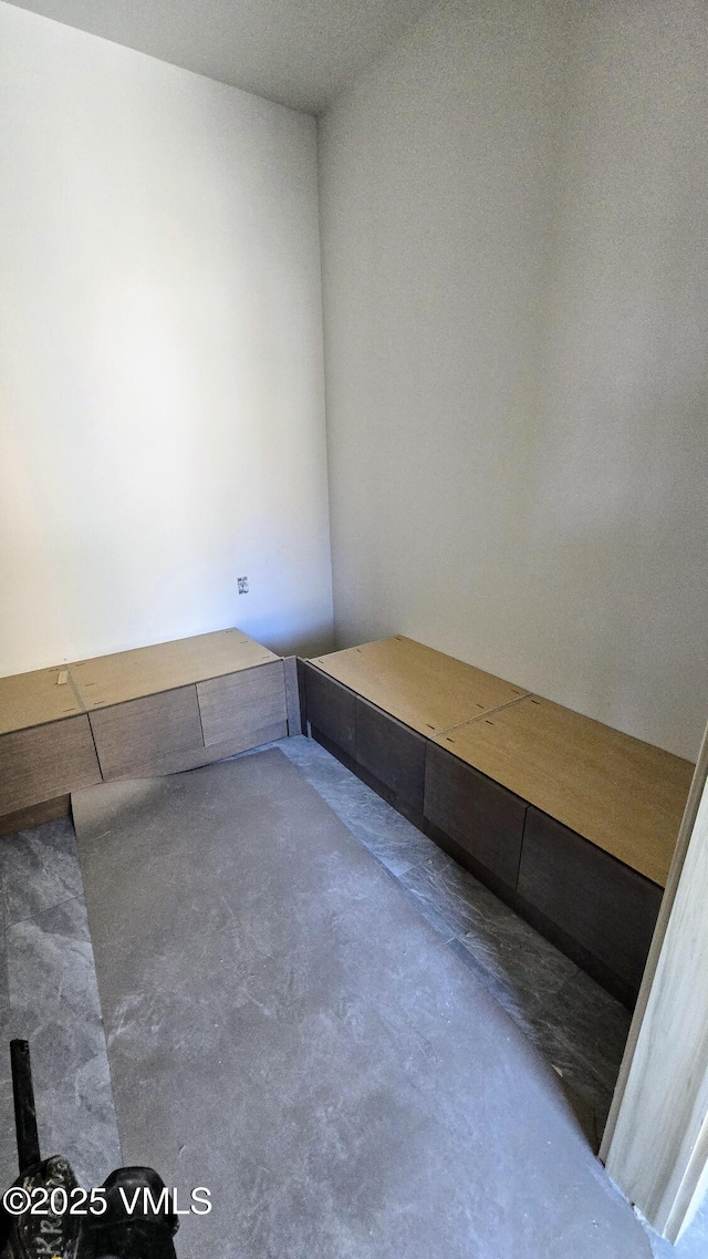213 Harvester Ct, Eagle, CO 81631 - unfurnished bedroom featuring concrete flooring