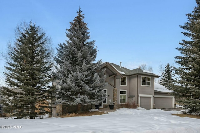 view of front of property featuring a garage