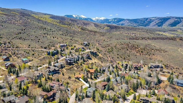 85 Remington Trl, Edwards, CO 81632 - aerial view of property and surrounding area with a mountainous background and nearby suburban area