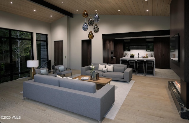 1150 Ptarmigan Rd, Vail, CO 81657 - lobby with recessed lighting, high vaulted ceiling, and a wooden ceiling with exposed beams