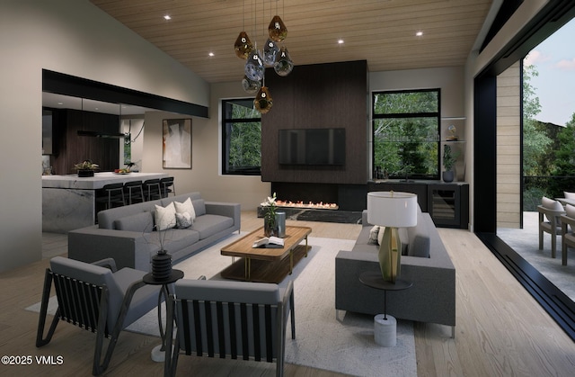 1150 Ptarmigan Rd, Vail, CO 81657 - living room featuring wood ceiling, wood finished floors, recessed lighting, a large fireplace, and beverage cooler