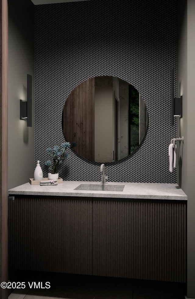 1150 Ptarmigan Rd, Vail, CO 81657 - bathroom featuring vanity and tasteful backsplash