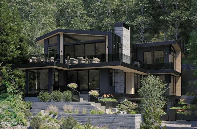 1150 Ptarmigan Rd, Vail, CO 81657 - back of property with a balcony, a sunroom, and stairway