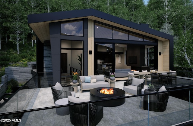 1150 Ptarmigan Rd, Vail, CO 81657 - view of patio / terrace with an outdoor living space with a fire pit