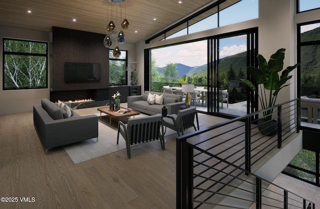 1150 Ptarmigan Rd, Vail, CO 81657 - living room with light wood-style flooring, wood ceiling, recessed lighting, and lofted ceiling