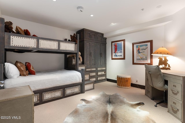 bedroom with recessed lighting, light colored carpet, and baseboards