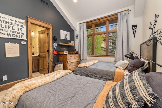 922 June Creek Rd, Edwards, CO 81632 - bedroom featuring vaulted ceiling and ensuite bath