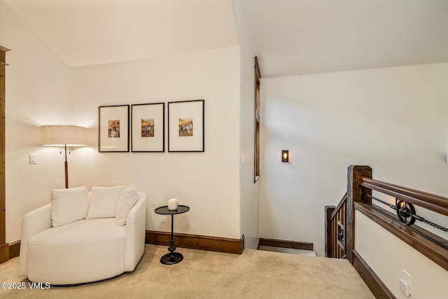 922 June Creek Rd, Edwards, CO 81632 - living area featuring an upstairs landing, carpet floors, baseboards, and lofted ceiling