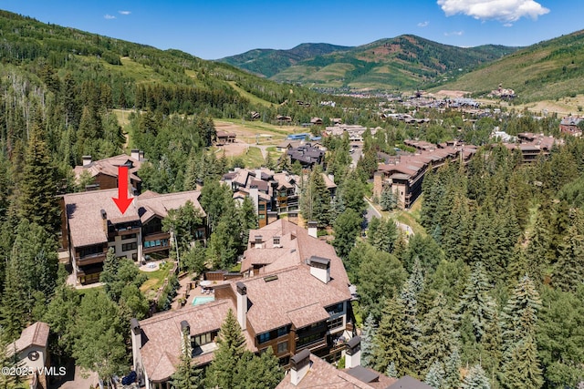 600 Vail Valley Dr Unit 310, Vail, CO 81657 - aerial view of property's location featuring a mountain backdrop and nearby suburban area