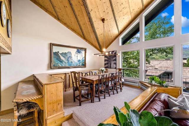 600 Vail Valley Dr Unit 310, Vail, CO 81657 - dining room featuring high vaulted ceiling, carpet flooring, and wooden ceiling