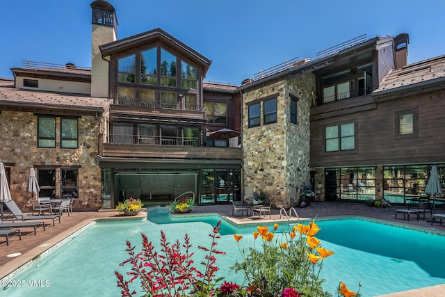 600 Vail Valley Dr Unit 310, Vail, CO 81657 - outdoor pool featuring a patio area