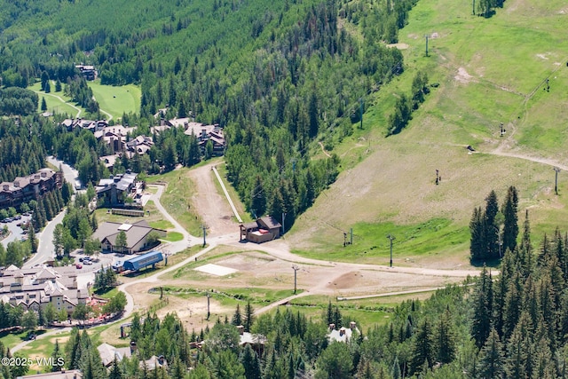 600 Vail Valley Dr Unit 310, Vail, CO 81657 - aerial view of property and surrounding area featuring a forest