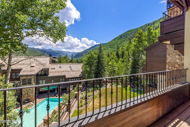 600 Vail Valley Dr Unit 310, Vail, CO 81657 - balcony with a mountain view and view of pool area