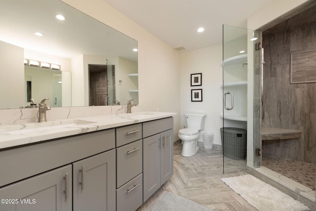 4515 Bighorn Rd, Vail, CO 81657 - full bath featuring toilet, double vanity, a stall shower, and recessed lighting