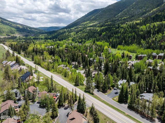 4515 Bighorn Rd, Vail, CO 81657 - aerial view of residential area featuring a forest and mountains