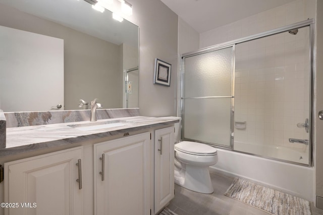 4515 Bighorn Rd, Vail, CO 81657 - bathroom featuring toilet, vanity, combined bath / shower with glass door, and wood finished floors