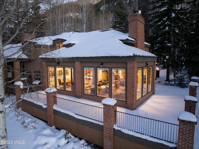 view of snow covered property