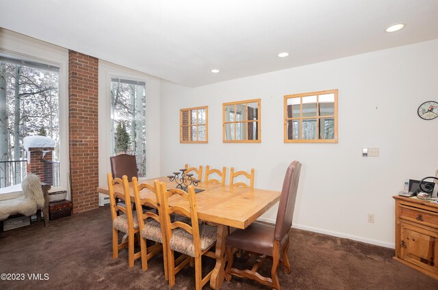 view of carpeted dining space