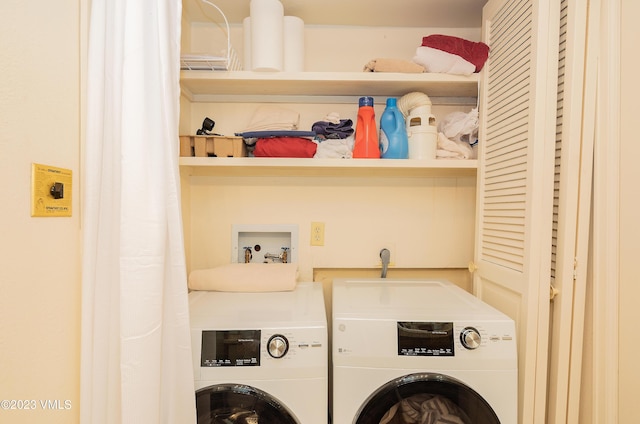 laundry room featuring washer and dryer