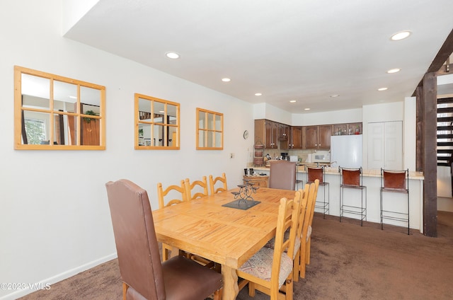 view of carpeted dining room