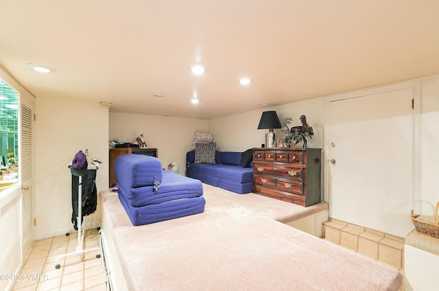 bedroom featuring light tile patterned floors