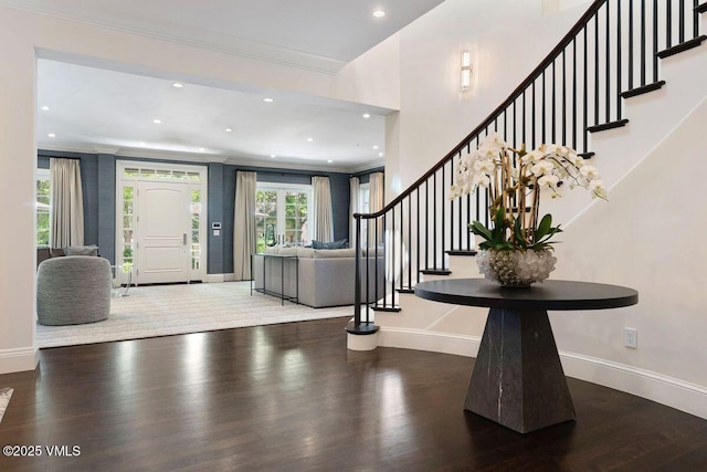 450 Steele St, Denver, CO 80236 - entryway with wood finished floors, stairs, crown molding, and recessed lighting