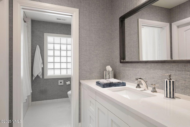 450 Steele St, Denver, CO 80236 - full bathroom featuring vanity and toilet