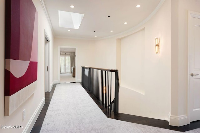 450 Steele St, Denver, CO 80236 - hall featuring a skylight, crown molding, recessed lighting, and an upstairs landing