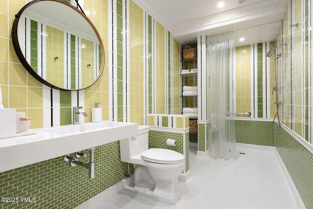 450 Steele St, Denver, CO 80236 - full bath featuring tile patterned flooring, tile walls, and a tile shower