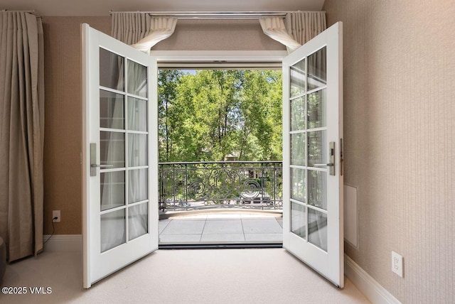 450 Steele St, Denver, CO 80236 - doorway to outside with french doors and baseboards