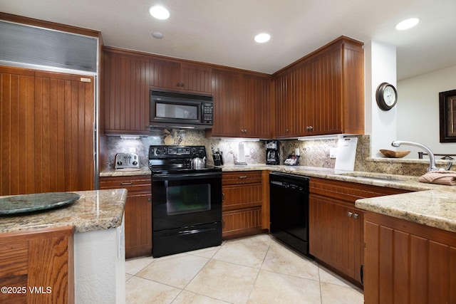 120 Offerson Rd Unit 4460, Beaver Creek, CO 81620 - kitchen featuring black appliances, light tile patterned floors, decorative backsplash, light stone countertops, and recessed lighting
