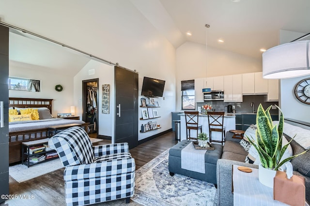 116 Thresher Ct, Eagle, CO 81631 - living area featuring high vaulted ceiling, dark wood-style flooring, and recessed lighting