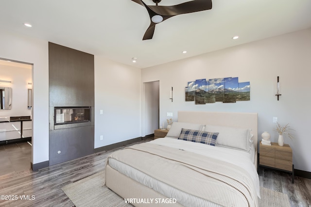 116 Thresher Ct, Eagle, CO 81631 - bedroom featuring baseboards, recessed lighting, wood finished floors, and a ceiling fan