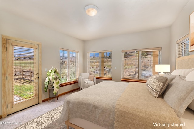 111 E Double Hitch Dr, Eagle, CO 81631 - carpeted bedroom featuring access to outside and baseboards