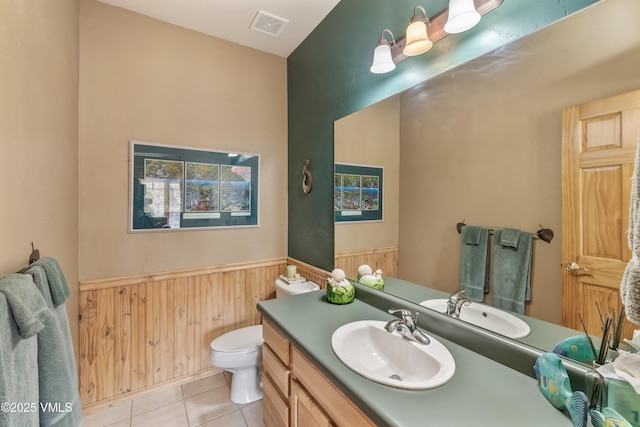 111 E Double Hitch Dr, Eagle, CO 81631 - bathroom with vanity, tile patterned floors, toilet, wainscoting, and visible vents
