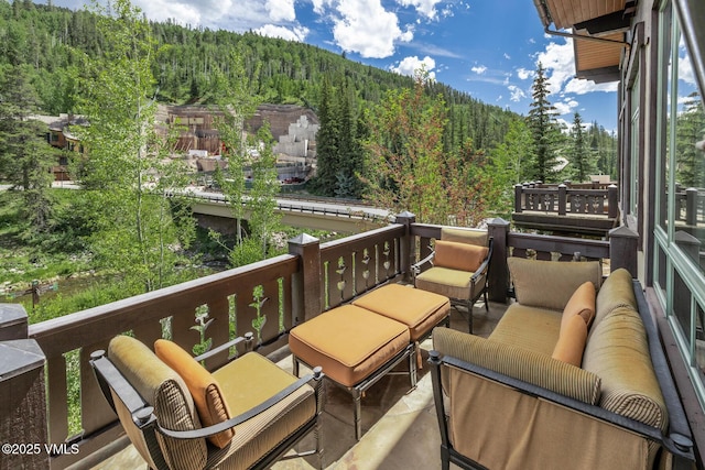 825 Forest Rd Unit 2, Vail, CO 81657 - balcony with a wooded view and outdoor lounge area