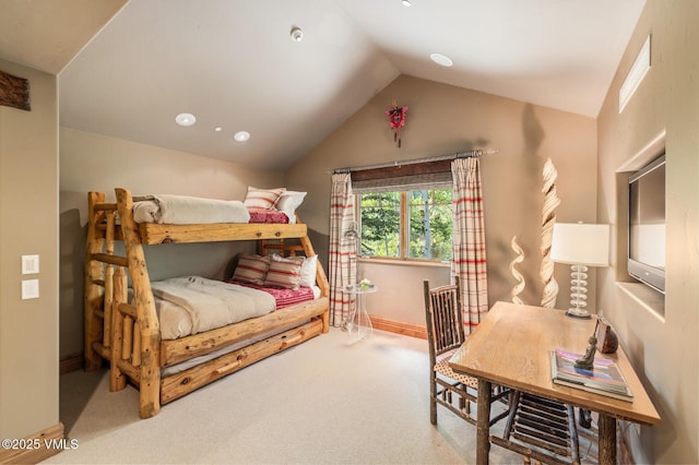 825 Forest Rd Unit 2, Vail, CO 81657 - carpeted bedroom featuring vaulted ceiling and baseboards