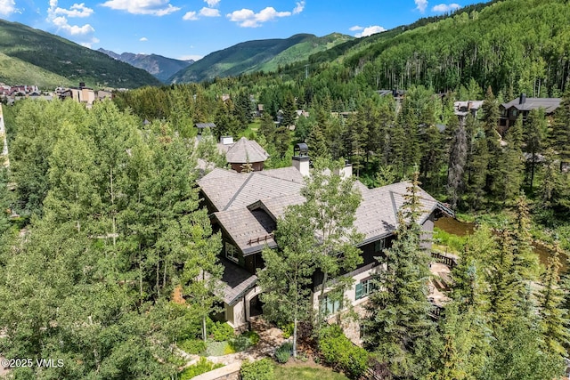 825 Forest Rd Unit 2, Vail, CO 81657 - view from above of property with a forest and a mountain backdrop
