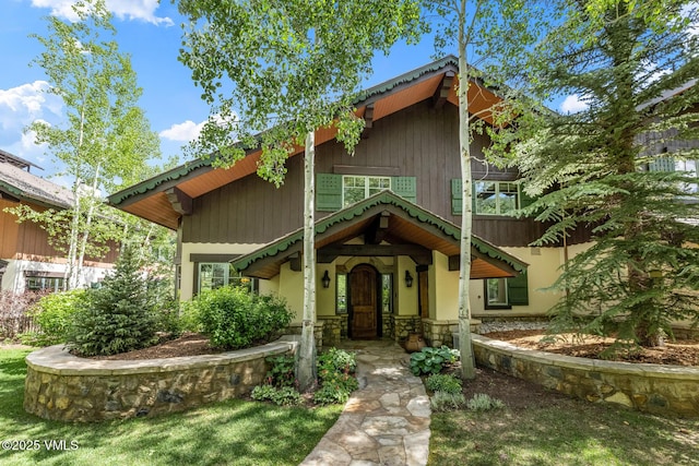 825 Forest Rd Unit 2, Vail, CO 81657 - view of front facade featuring stone siding