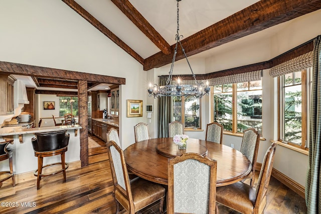 825 Forest Rd Unit 2, Vail, CO 81657 - dining space with hardwood / wood-style floors, a chandelier, beam ceiling, and high vaulted ceiling