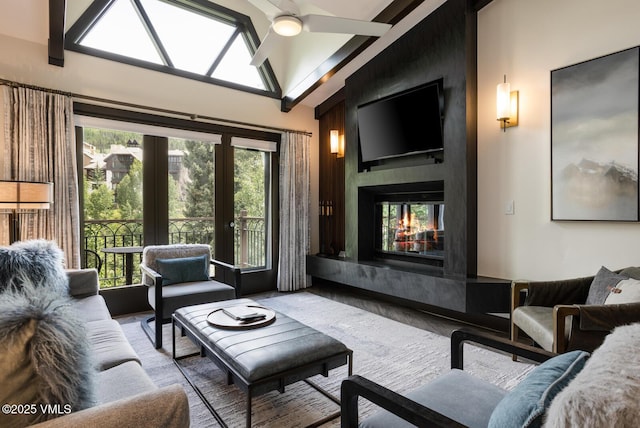 120 Offerson Unit 3430, Beaver Creek, CO 81620 - living room with a multi sided fireplace, a ceiling fan, high vaulted ceiling, and wood finished floors