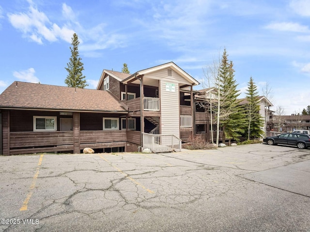 10000 Ryan Gulch Rd Unit 114, Silverthorne, CO 80498 - view of building exterior featuring uncovered parking