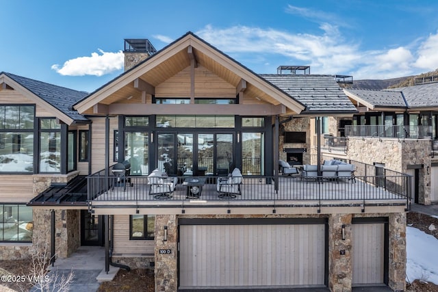 exterior space featuring a garage and a chimney