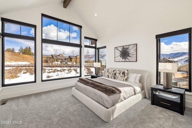 bedroom with beam ceiling, visible vents, carpet floors, and high vaulted ceiling