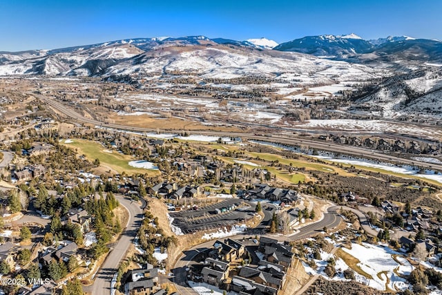 birds eye view of property featuring a mountain view and a residential view