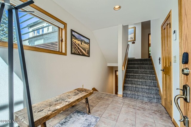 3050 Wildridge Rd Unit 3, Avon, CO 81620 - stairs with recessed lighting and vaulted ceiling