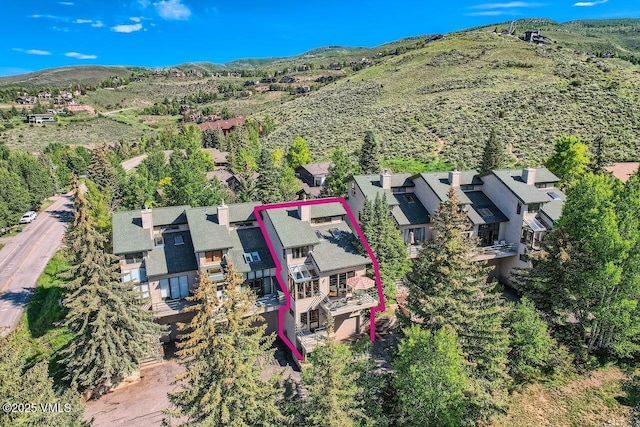 3050 Wildridge Rd Unit 3, Avon, CO 81620 - aerial view of residential area with property boundaries highlighted and a mountain backdrop